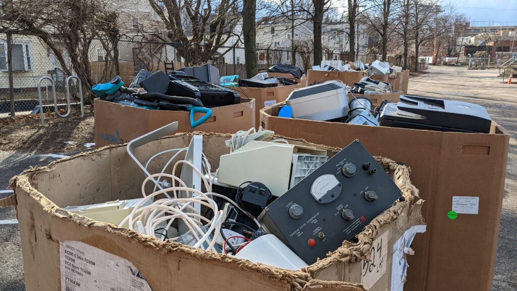 overflowing bins of electronics